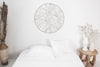 picture of the one sheet in the white color on a bed in a bedroom